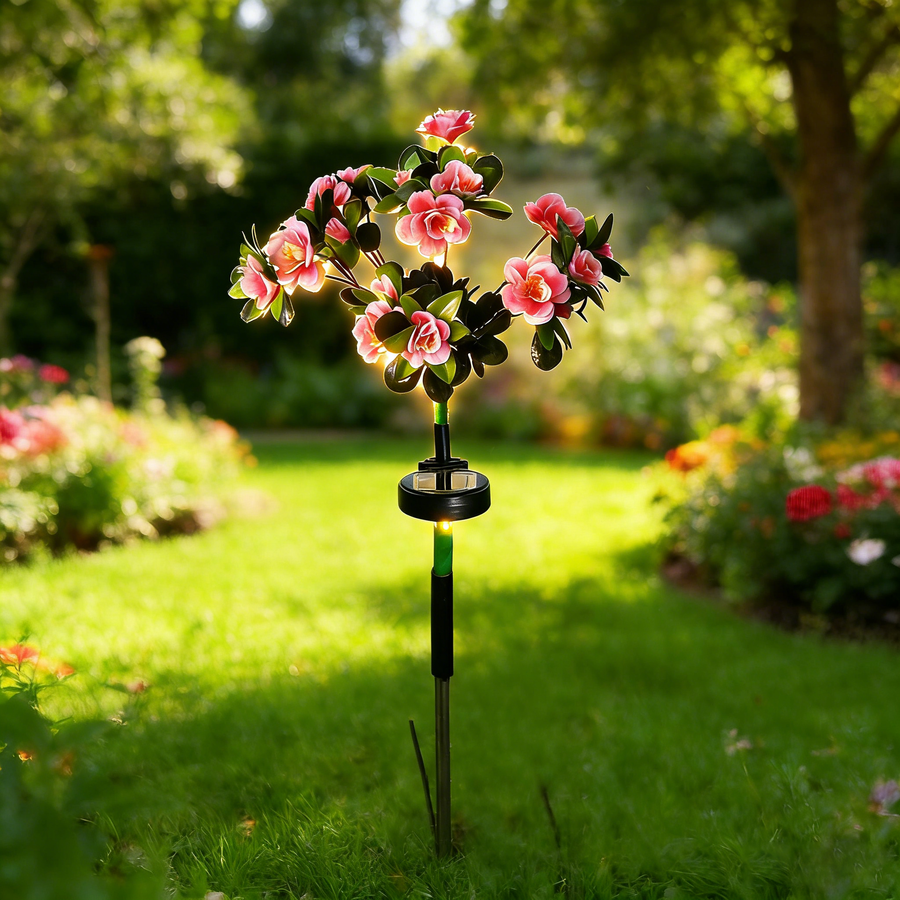 Pink solar flower light daytime garden